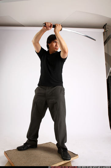 Man Adult Average Fighting with sword Standing poses Casual Asian