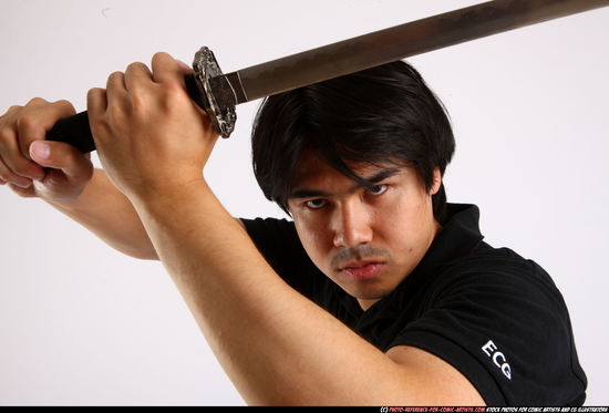 Man Adult Average Fighting with sword Standing poses Casual Asian