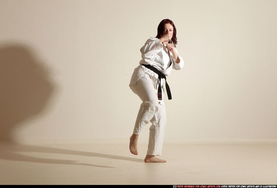 Woman Adult Average White Martial art Moving poses Sportswear