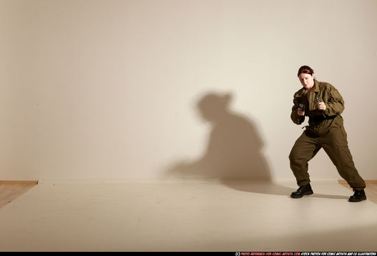 Woman Adult Average White Fighting with gun Moving poses Army