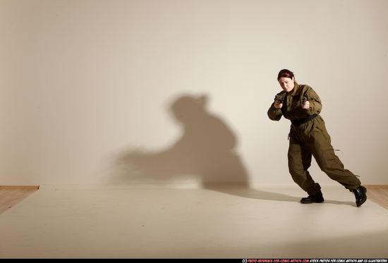 Woman Adult Average White Fighting with gun Moving poses Army