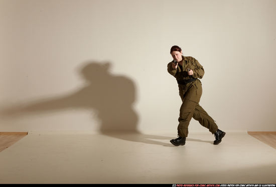 Woman Adult Average White Fighting with gun Moving poses Army