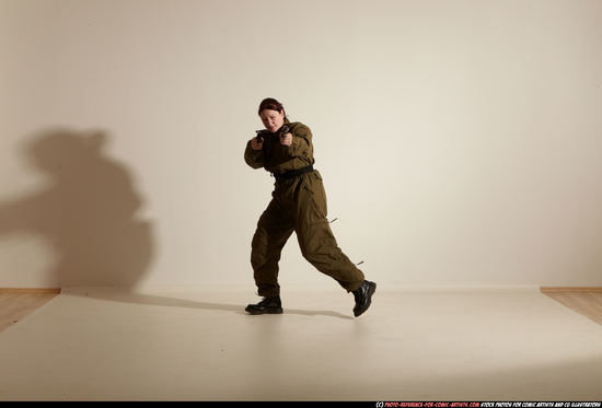 Woman Adult Average White Fighting with gun Moving poses Army