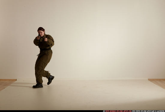 Woman Adult Average White Fighting with gun Moving poses Army