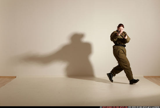 Woman Adult Average White Fighting with gun Moving poses Army