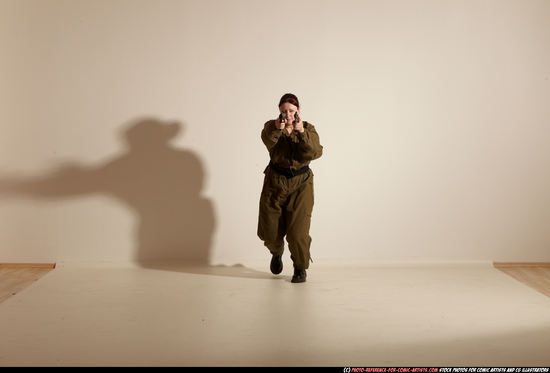 Woman Adult Average White Fighting with gun Moving poses Army