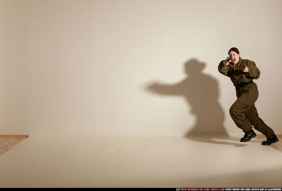 Woman Adult Average White Fighting with gun Moving poses Army