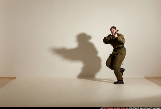 Woman Adult Average White Fighting with gun Moving poses Army