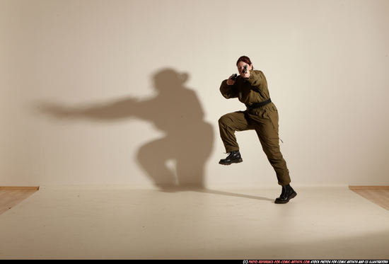 Woman Adult Average White Fighting with gun Moving poses Army