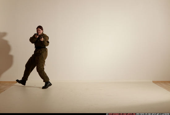 Woman Adult Average White Fighting with gun Moving poses Army