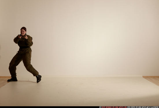 Woman Adult Average White Fighting with gun Moving poses Army