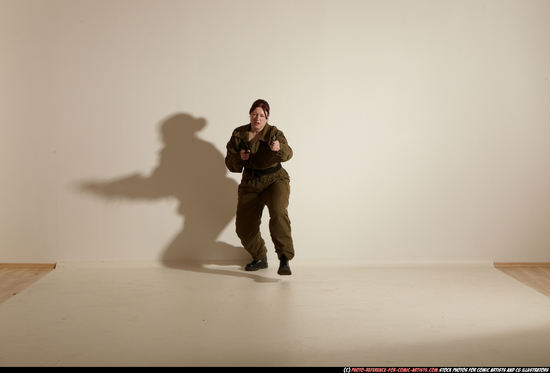 Woman Adult Average White Fighting with gun Moving poses Army