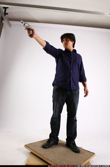 Man Adult Average Fighting with gun Standing poses Casual Asian