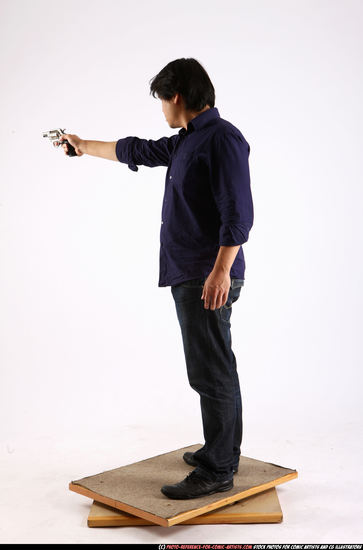 Man Adult Average Fighting with gun Standing poses Casual Asian