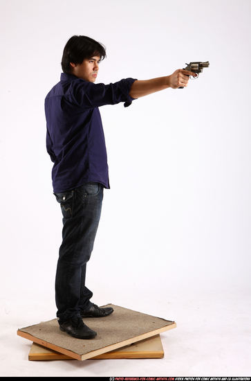 Man Adult Average Fighting with gun Standing poses Casual Asian