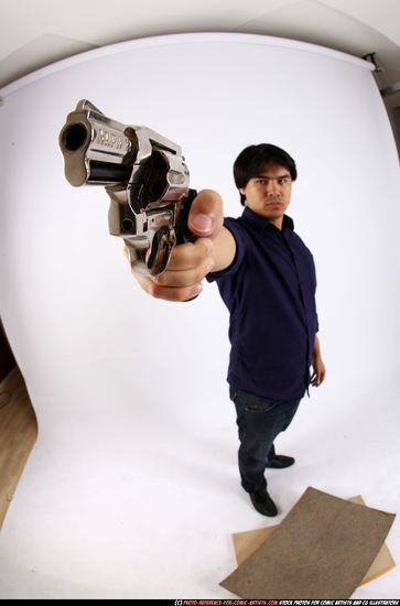 Man Adult Average Fighting with gun Standing poses Casual Asian