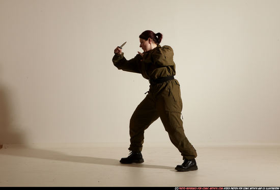 Woman Adult Average White Fighting with knife Moving poses Army