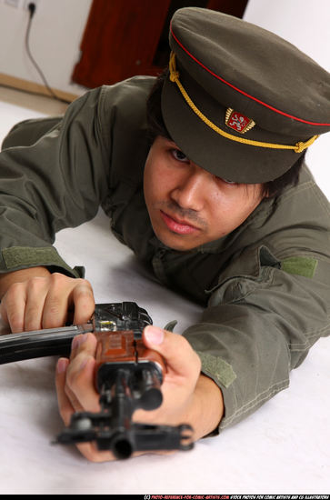 Man Adult Average Fighting with submachine gun Laying poses Army Asian