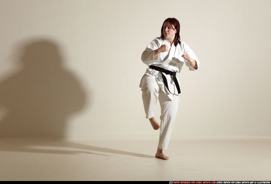 Woman Adult Average White Martial art Moving poses Sportswear