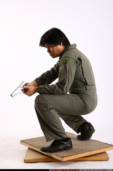 Man Adult Average Fighting with gun Kneeling poses Army Asian