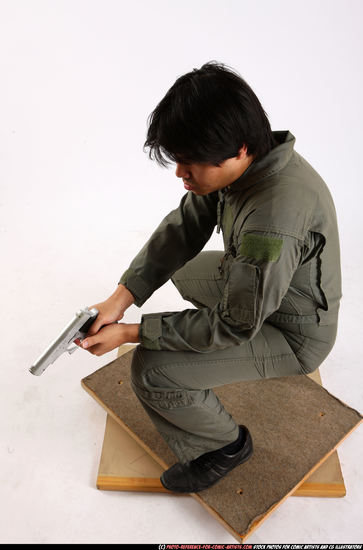 Man Adult Average Fighting with gun Kneeling poses Army Asian