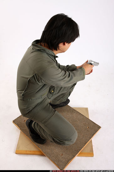 Man Adult Average Fighting with gun Kneeling poses Army Asian