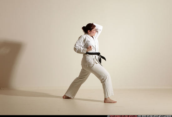 Woman Adult Average White Martial art Moving poses Sportswear