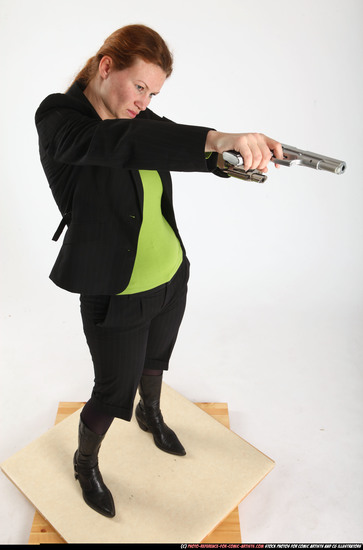 Woman Adult Average White Fighting with gun Standing poses Business