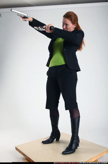 Woman Adult Average White Fighting with gun Standing poses Business