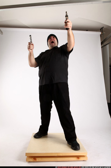 Man Adult Average White Fighting with gun Standing poses Casual