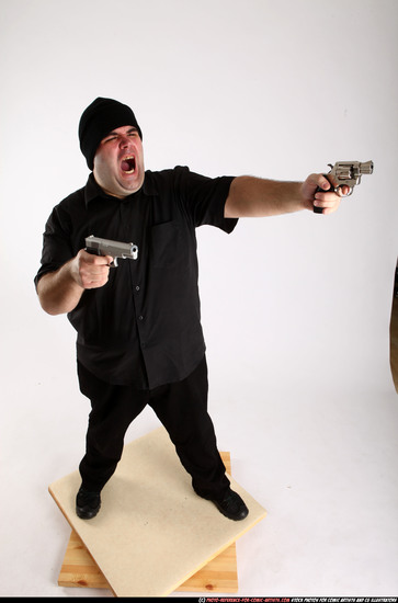 Man Adult Average White Fighting with gun Standing poses Casual