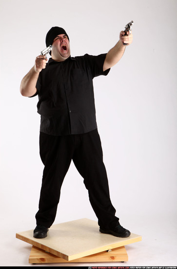 Man Adult Average White Fighting with gun Standing poses Casual