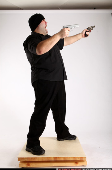 Man Adult Average White Fighting with gun Standing poses Casual