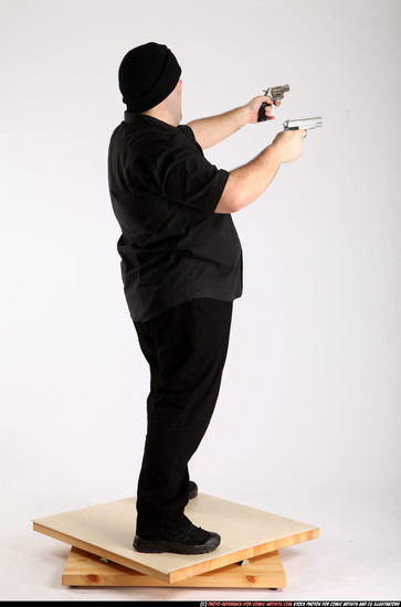 Man Adult Average White Fighting with gun Standing poses Casual