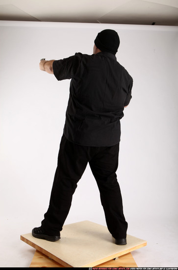 Man Adult Average White Fighting with gun Standing poses Casual