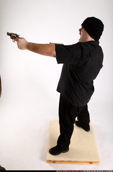 Man Adult Average White Fighting with gun Standing poses Casual