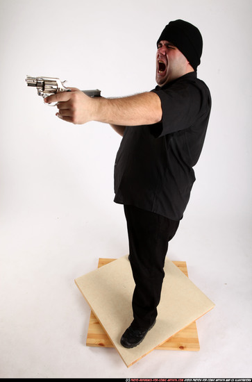 Man Adult Average White Fighting with gun Standing poses Casual