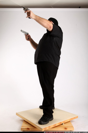 Man Adult Average White Fighting with gun Standing poses Casual