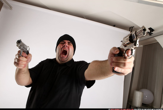 Man Adult Average White Fighting with gun Standing poses Casual