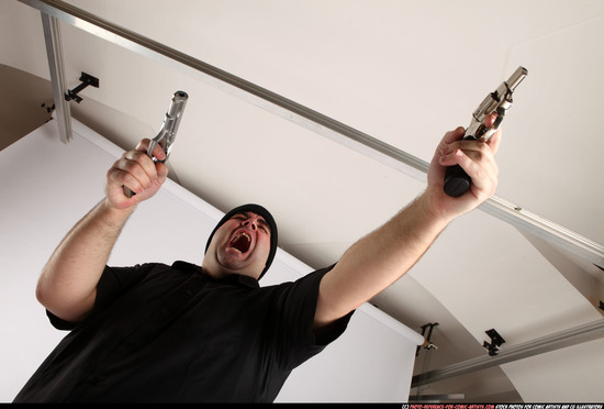 Man Adult Average White Fighting with gun Standing poses Casual