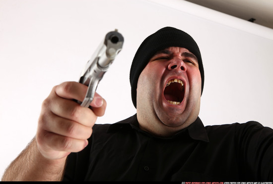 Man Adult Average White Fighting with gun Standing poses Casual