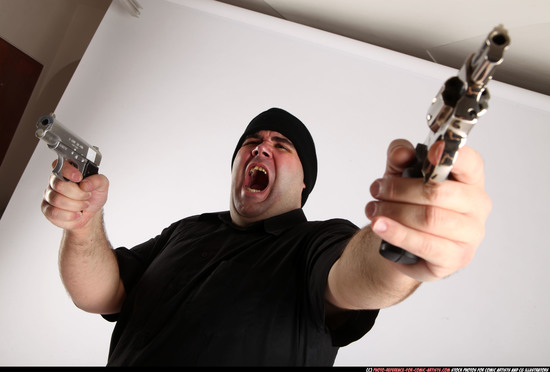 Man Adult Average White Fighting with gun Standing poses Casual