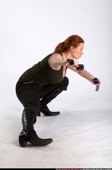 Woman Adult Athletic White Fighting with sword Kneeling poses Casual