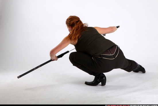 Woman Adult Athletic White Fighting with sword Kneeling poses Casual