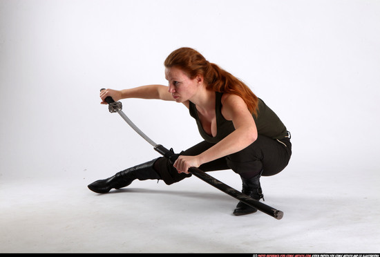 Woman Adult Athletic White Fighting with sword Kneeling poses Casual