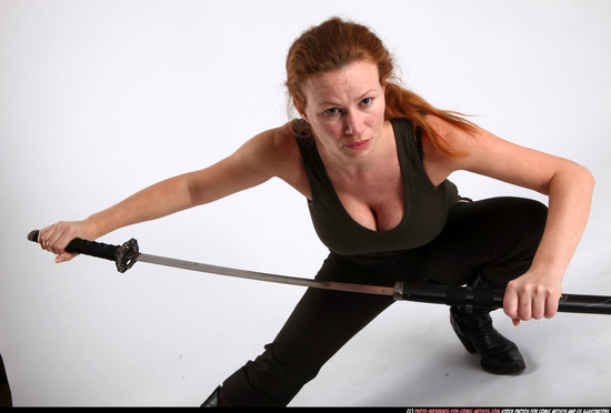 Woman Adult Athletic White Fighting with sword Kneeling poses Casual