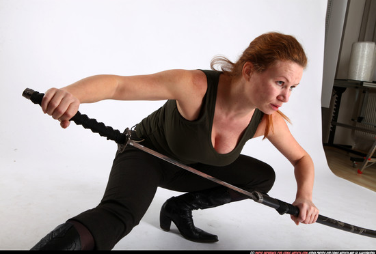 Woman Adult Athletic White Fighting with sword Kneeling poses Casual