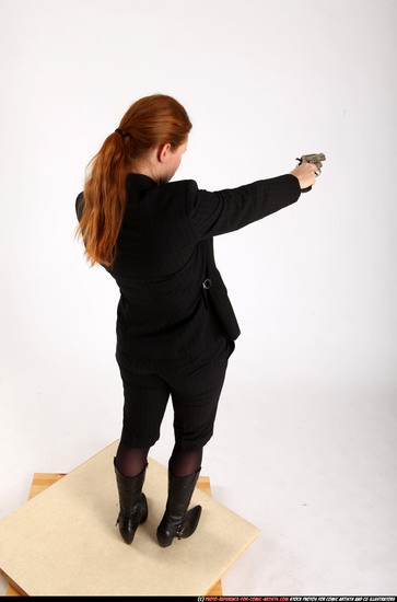 Woman Adult Athletic White Fighting with gun Standing poses Business