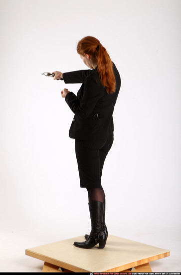 Woman Adult Athletic White Fighting with gun Standing poses Business