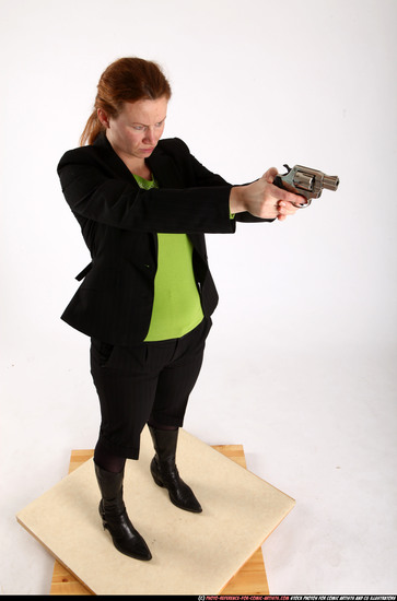 Woman Adult Average White Fighting with gun Standing poses Business